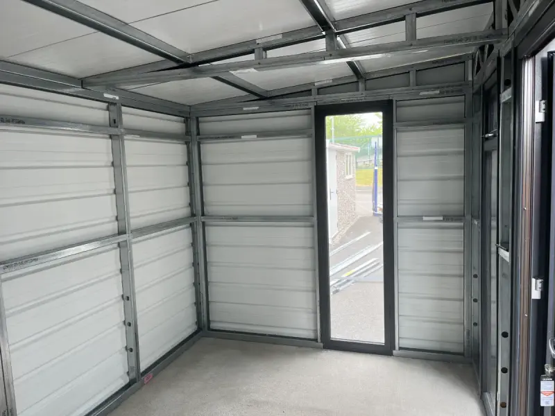 Interior view showing insulated panels and French doors