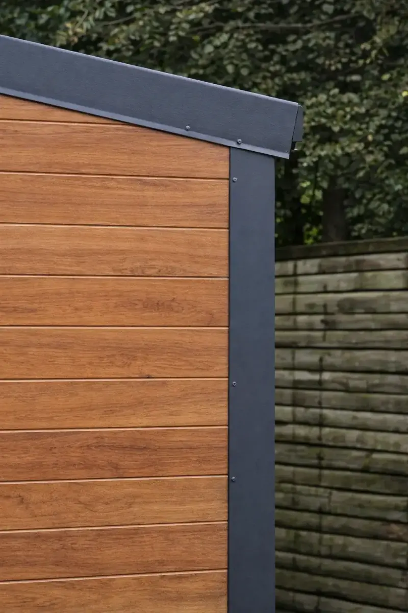Prestige building with warm wood-effect cladding, dark corner trim, and roofline detailing