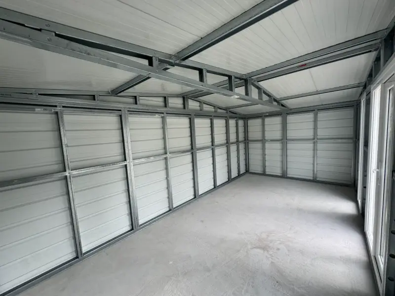 Spacious interior showing full steel frame and panel construction