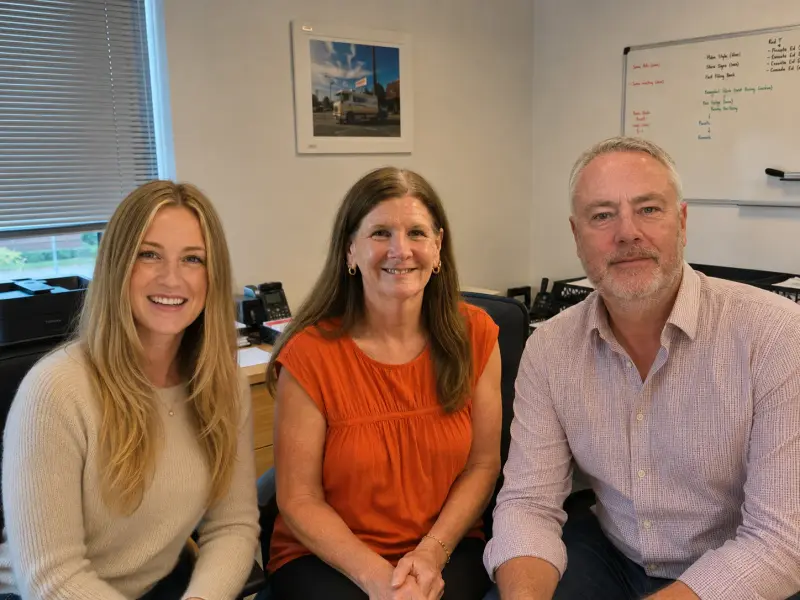 Heather, Sharon and Carl of Nucrete Online sitting together in the sales office